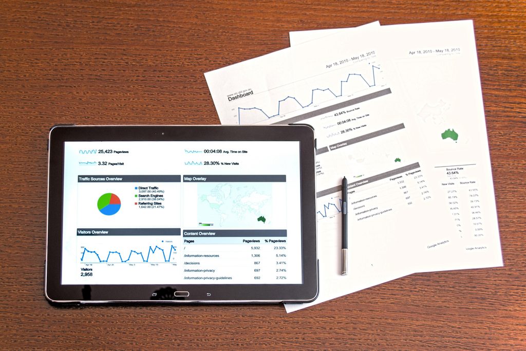 Tablet and paperwork